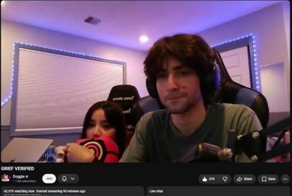 Cropped screenshot of a Geometry Dash live stream showing an AndaSeat-branded chair in the streamer's setup